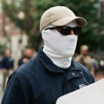 Manifestantes se tapan el rostro en Washington y se abre el debate sobre la ley de uso de máscaras